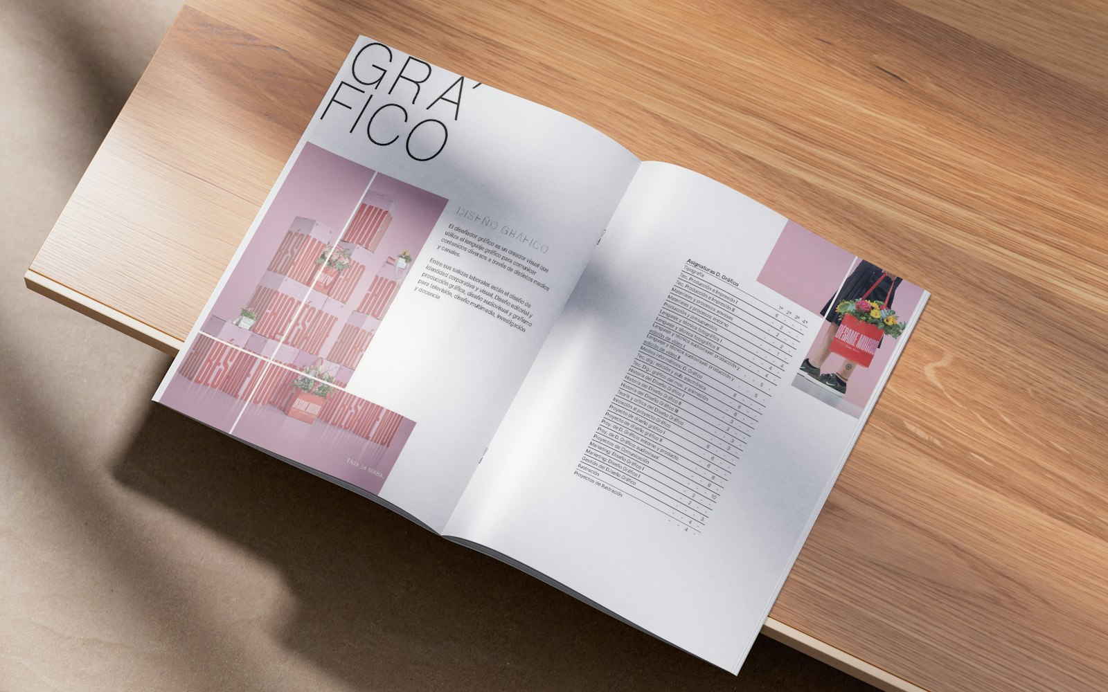 An open design brochure spread on a wooden shelf